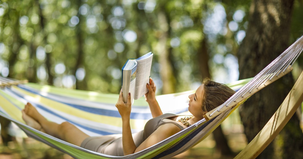 Women relaxingin one of the campsites under the Aminess Planet Camping Brand