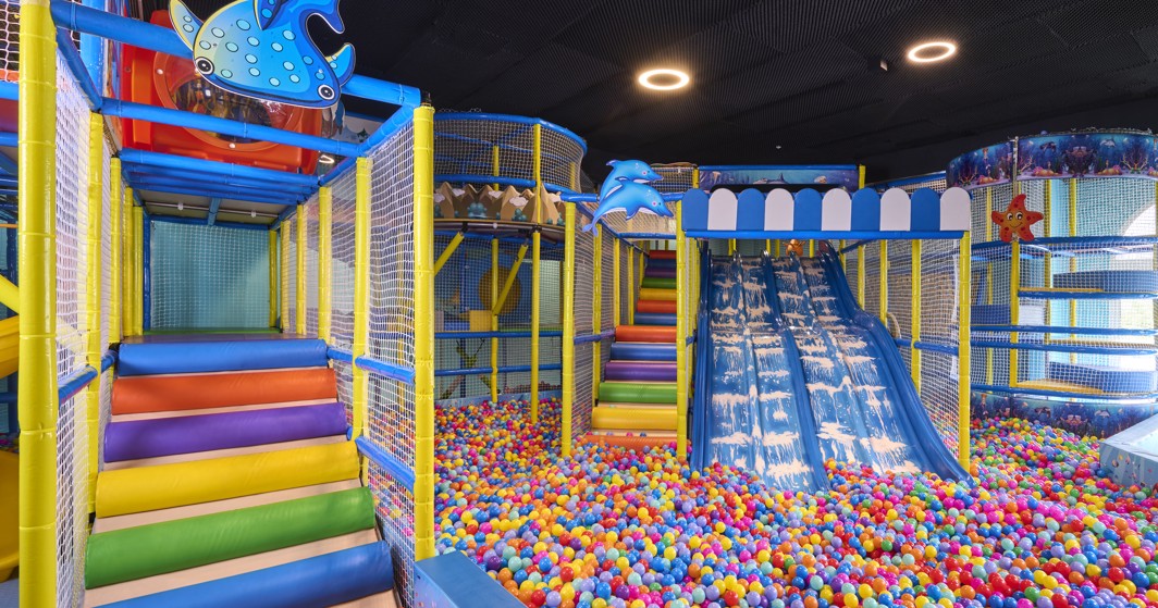 Colorful ball pit and slide at the Aminess Vival Casa Lišanj Ami Fun Park, perfect for children to enjoy playful activities.