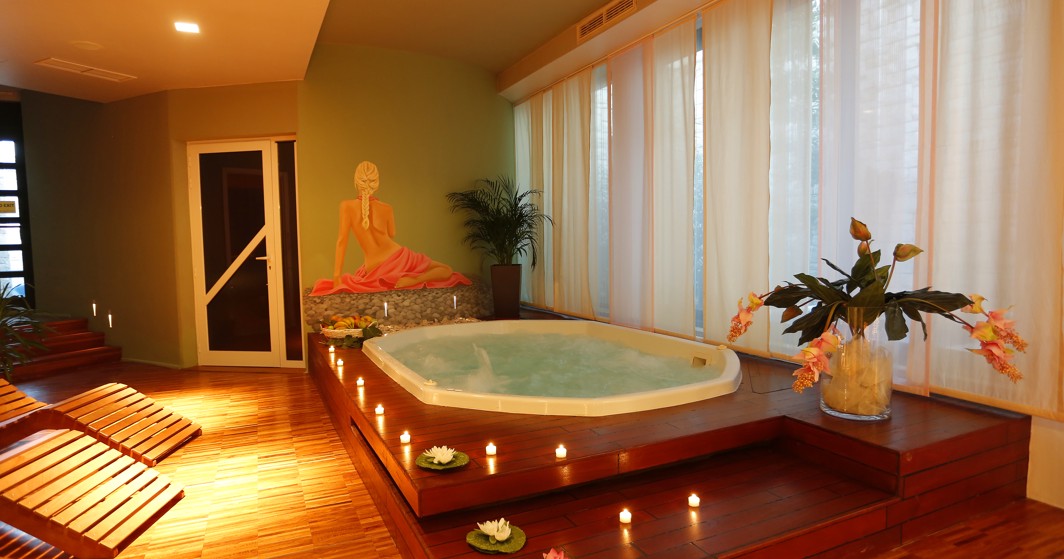 Luxury wellness jacuzzi with ambient lighting at Aminess Velaris Resort on Brač island