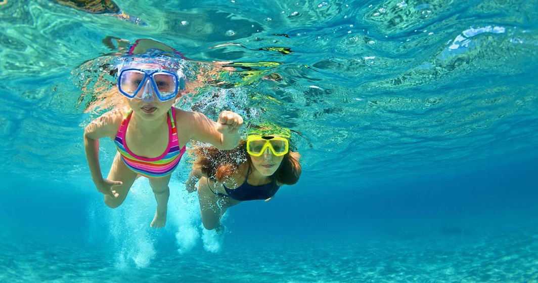 Children enjoying a fun snorkeling adventure at Aminess Vival Casa Lišanj, exploring the vibrant underwater world.