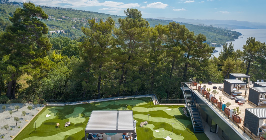 Mini golf at Younique Vollo Hotel Residences by Aminess with forest and sea views.