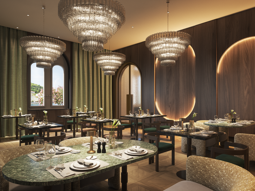 Refined interior of Younique Korčula Heritage Restaurant with elegantly set tables, crystal chandeliers and a warm atmosphere for a premium dining experience