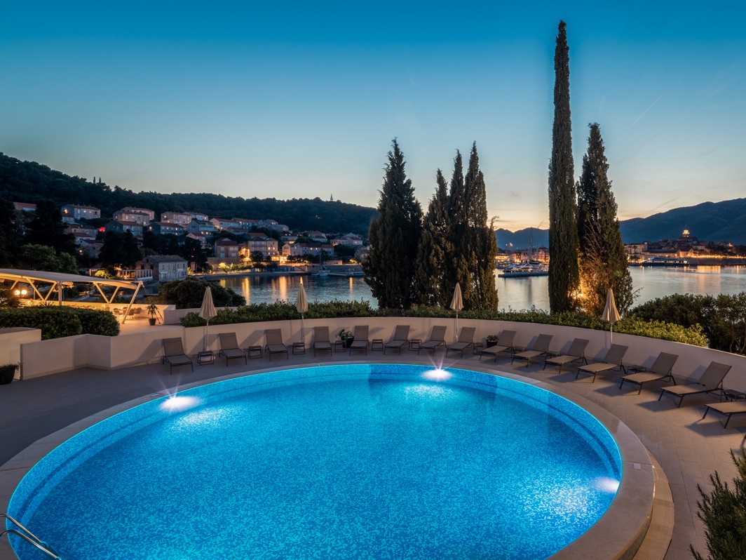 Liburna Hotel pool area in the evening setting