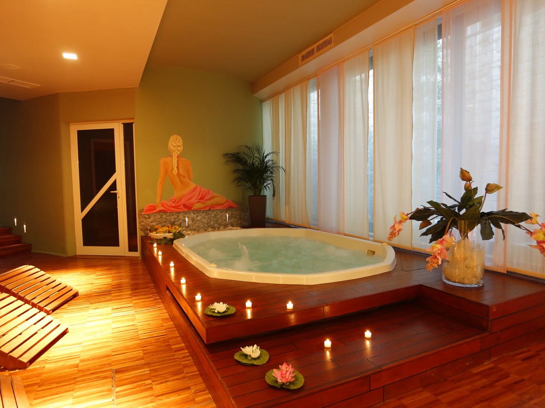 Luxury wellness jacuzzi with ambient lighting at Aminess Velaris Resort on Brač island