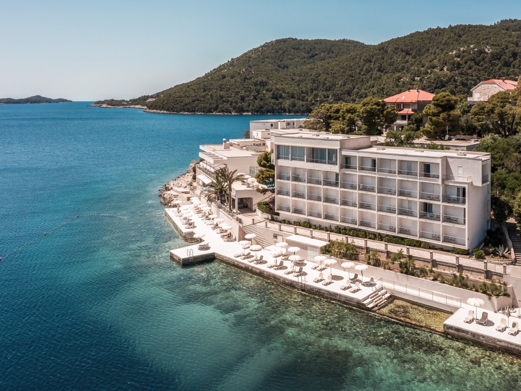 Panoramic view of Aminess Lume Hotel by the coast and pine trees