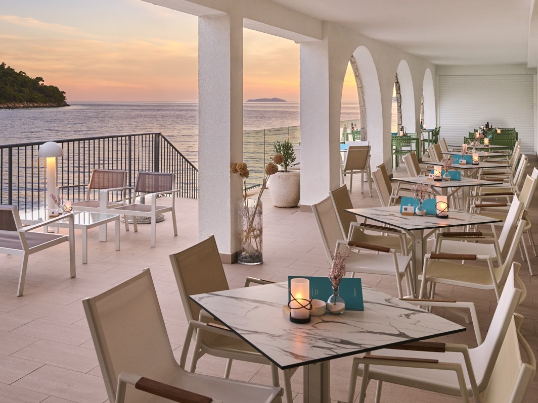 Modern yet traditional ambiance of a small, cozy, island waterfront at Aminess Younique Lume Hotel in Croatia.