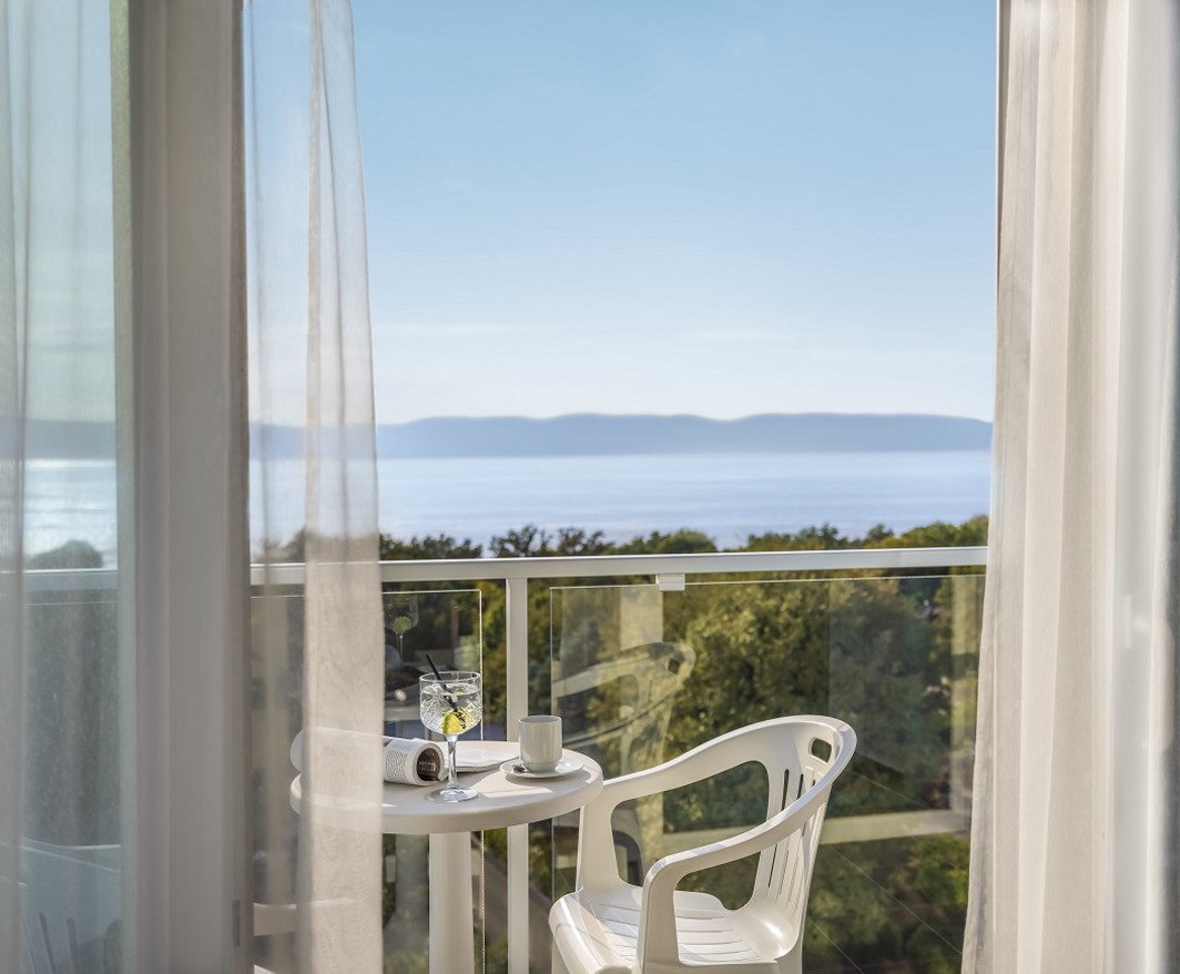Room balcony at Magal Maradiso Hotel by Aminess with a view of the sea.