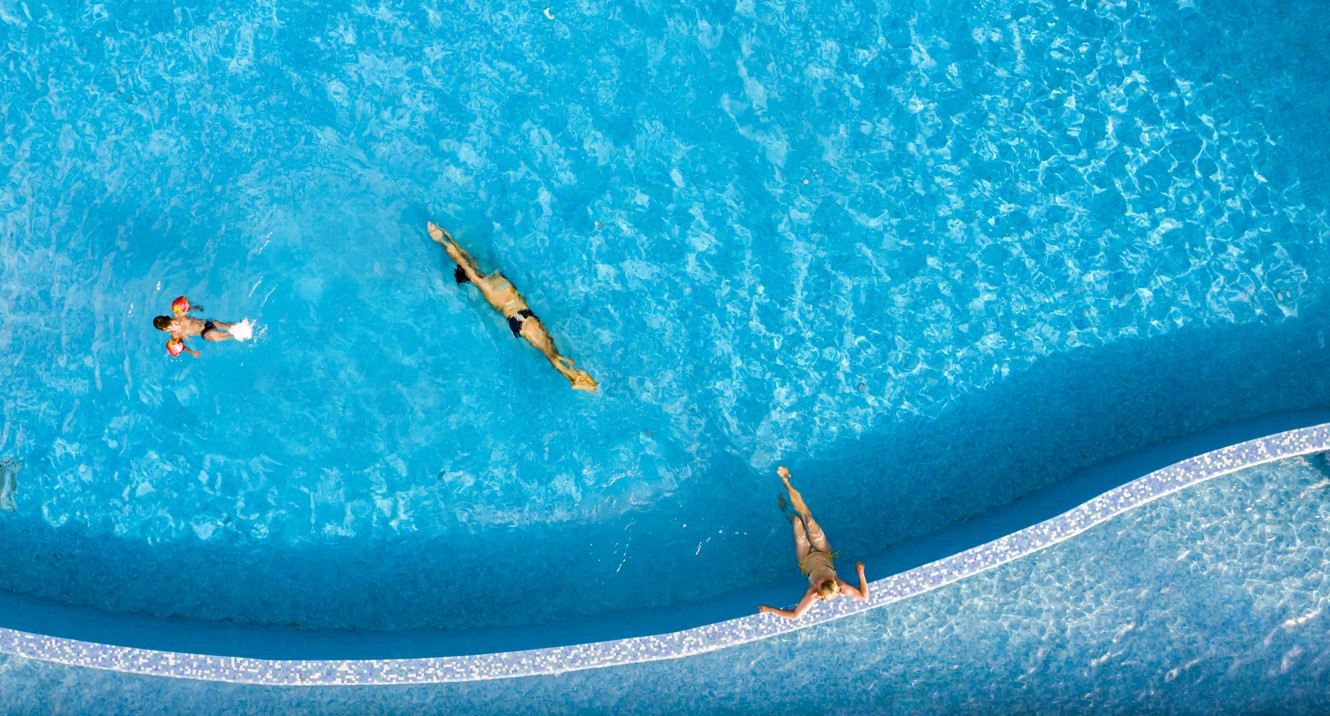 Aerial view of the infinity pool within resort near Aminess Port9 Residence.