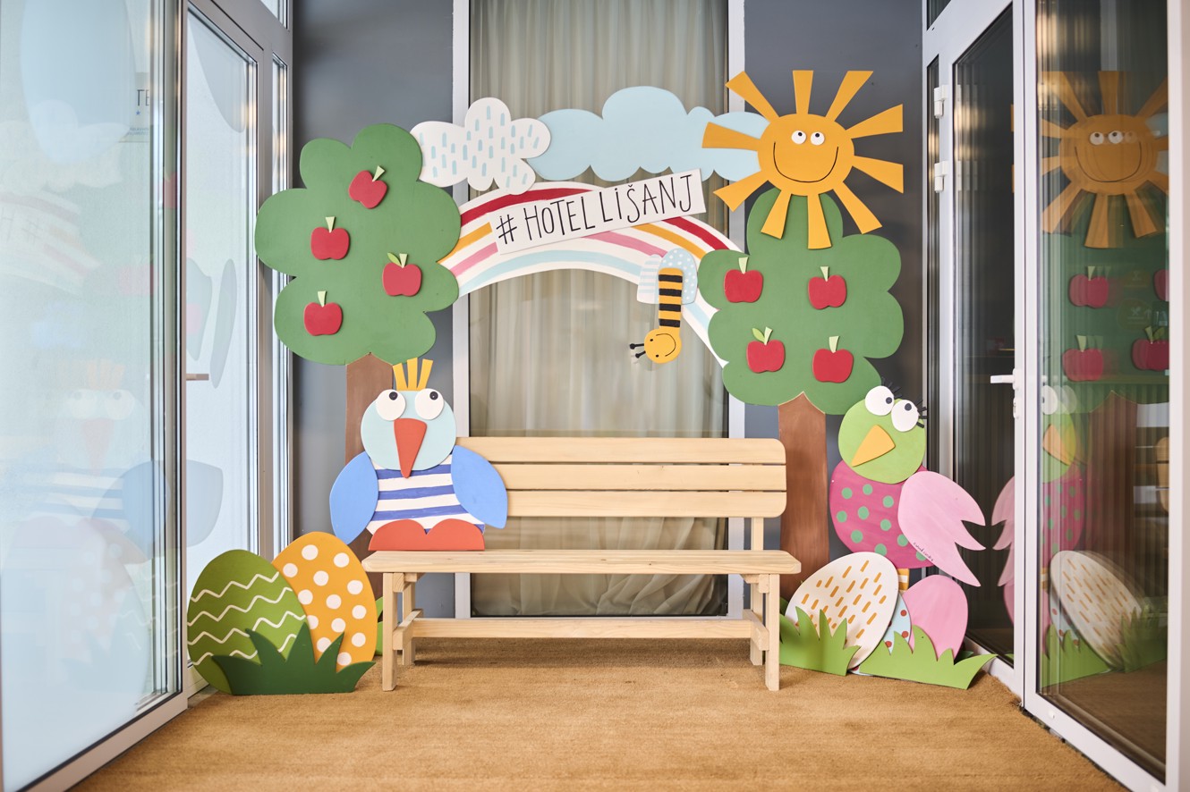 Colorful photo wall at Aminess Vival Lišanj Family Hotel, a perfect spot for family pictures in Novi Vinodolski.