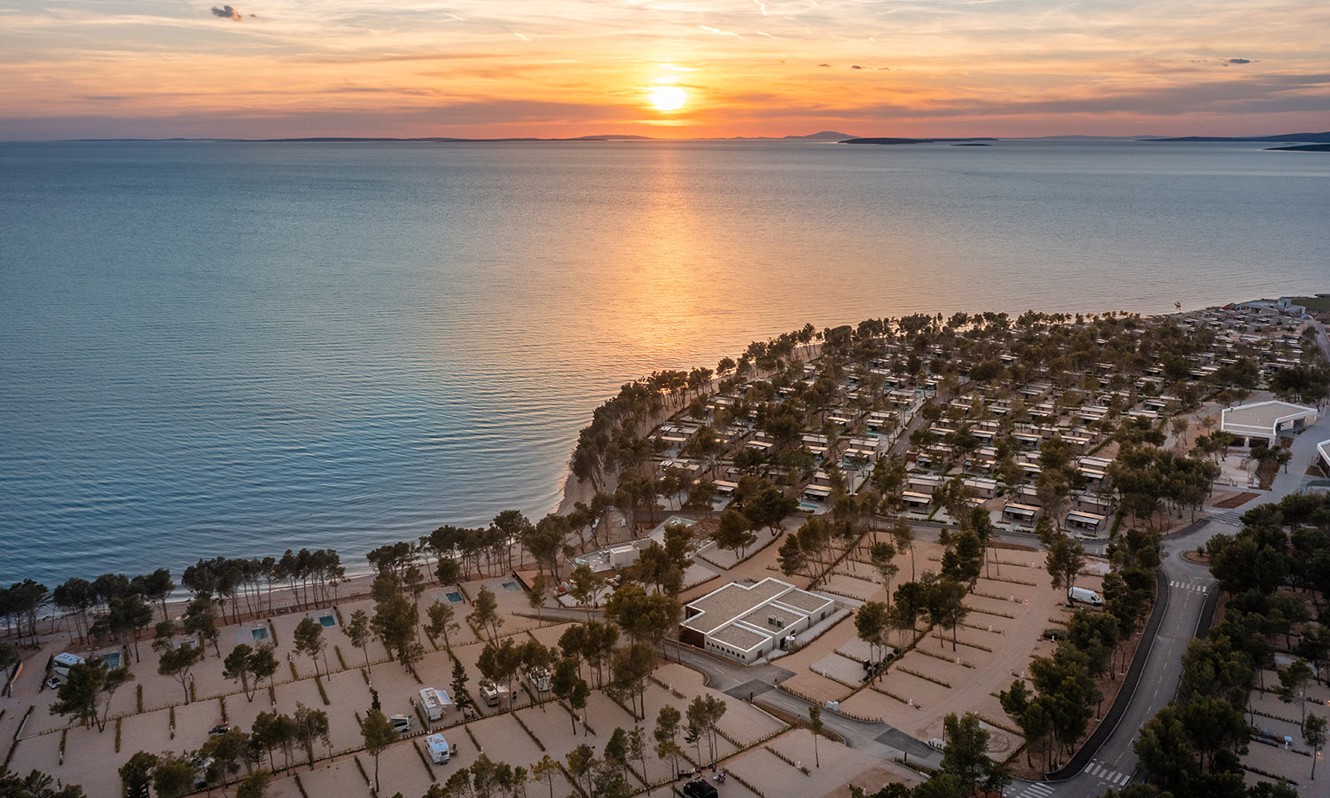 Panoramic views of the pitches for campers and the sunset at Aminess Style Camping Avalona resort.