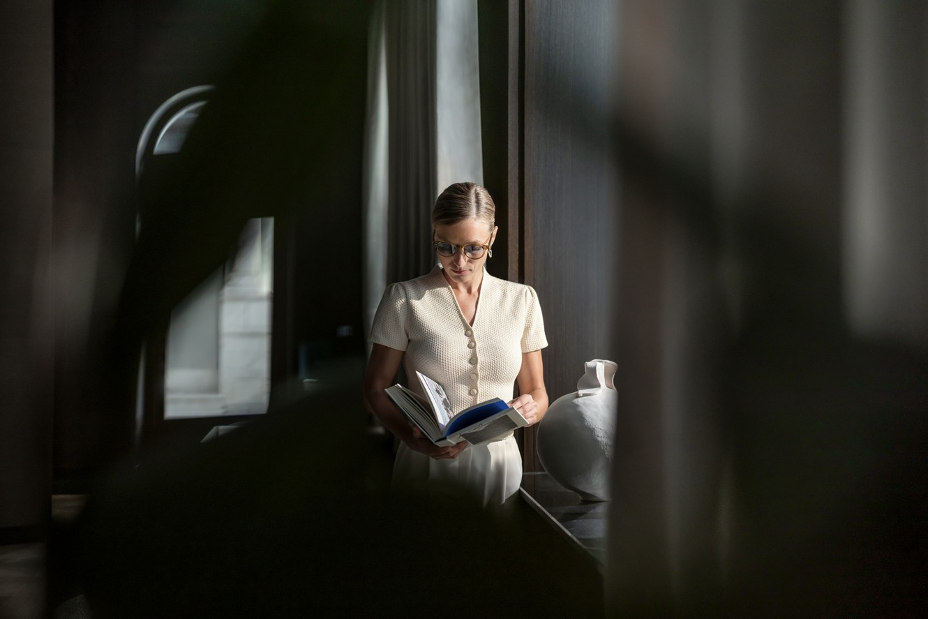 A guest reads a book inside Aminess Younique Korcula Heritage Hotel.