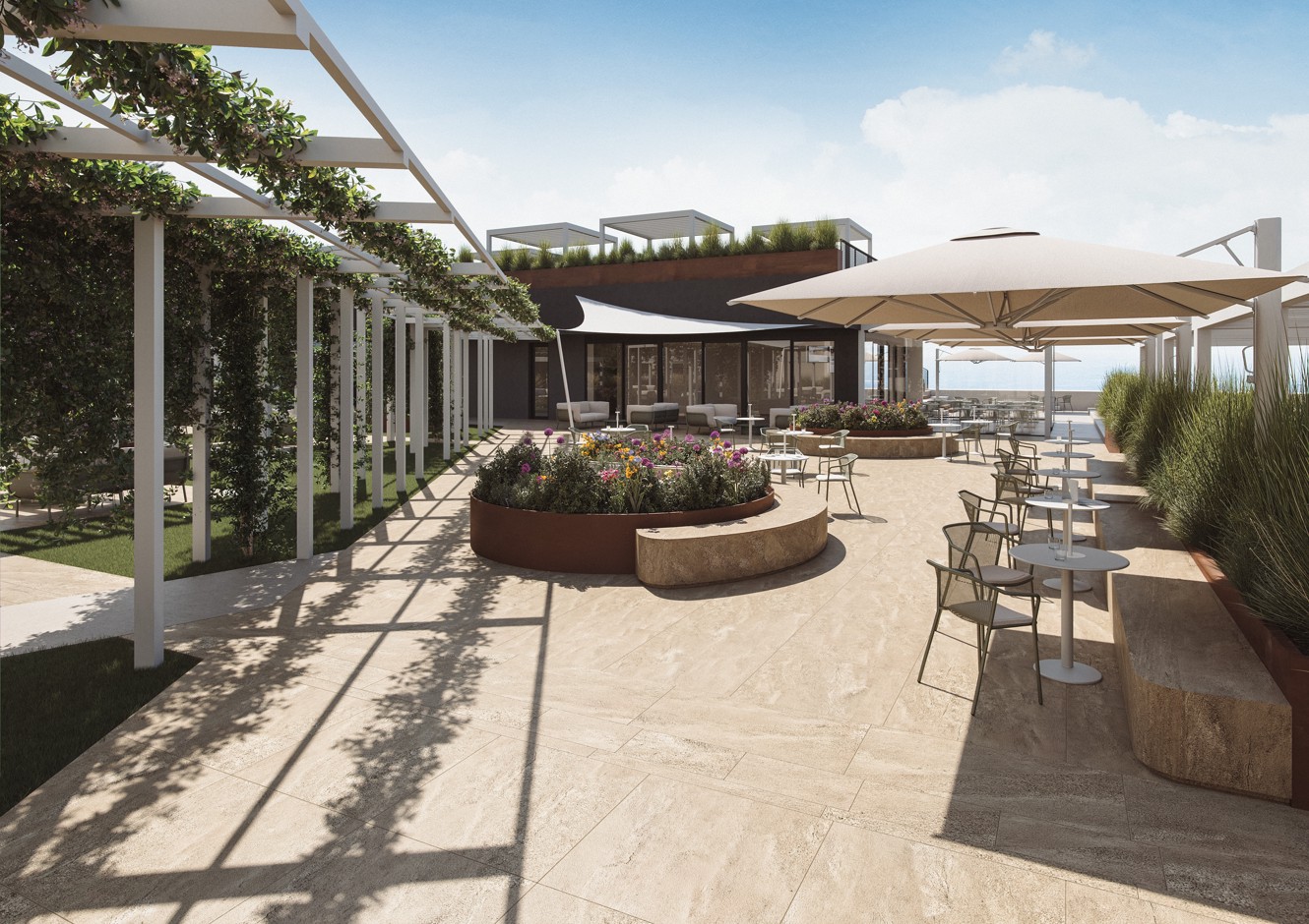 Terrazza esterna del ristorante Il Cantuccio con pergolato, verde mediterraneo e atmosfera lounge rilassata