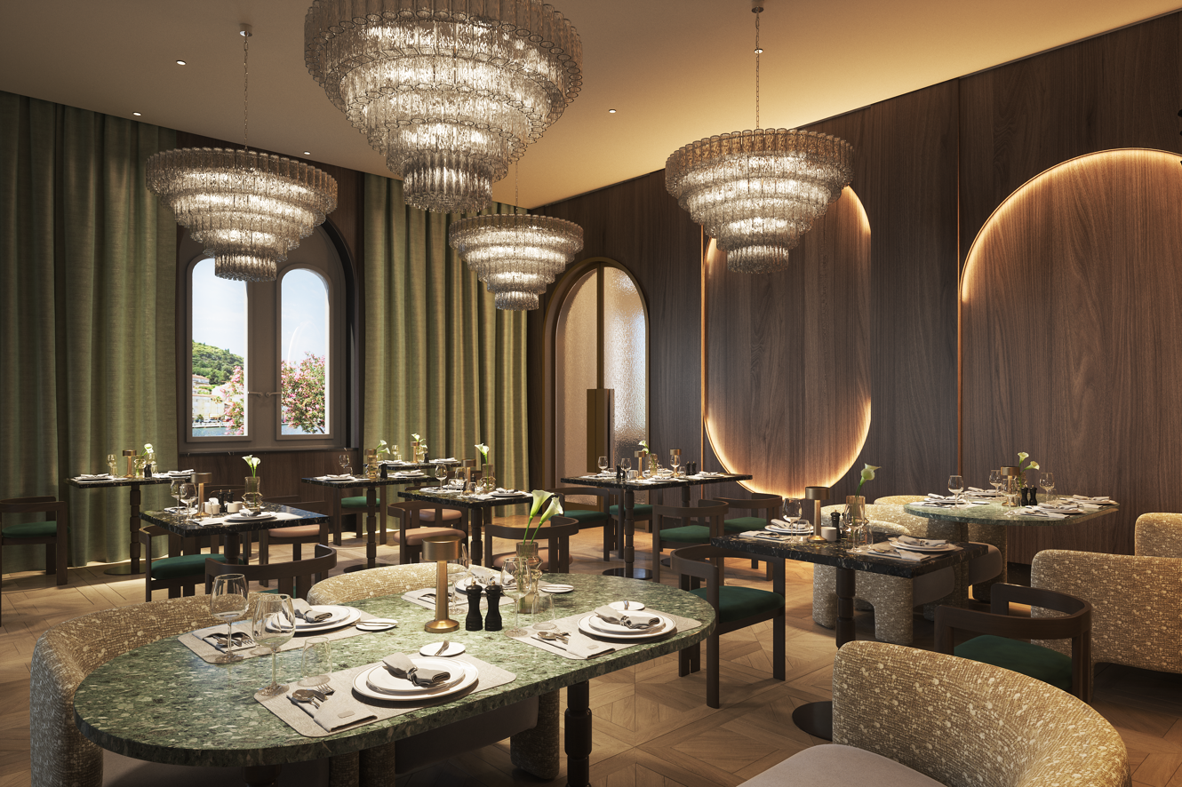 Refined interior of Younique Korčula Heritage Restaurant with elegantly set tables, crystal chandeliers and a warm atmosphere for a premium dining experience