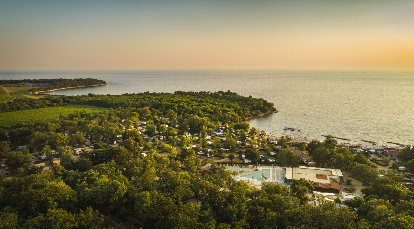 Aerial view of the sunset over the Aminess Planet Camping Maravea, Novigrad