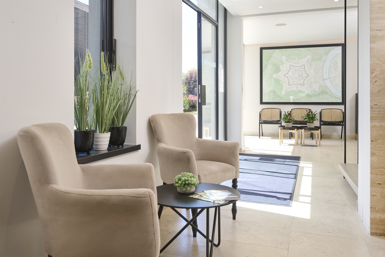 Reception lounge area at Aminess Florian Godler Hotel.