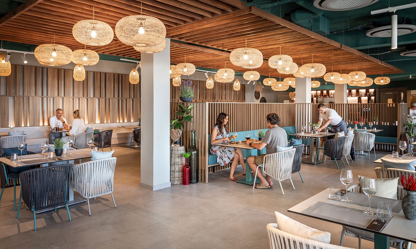 Guests enjoying their lunch at Half8 restaurant in Aminess Style Camping Avalona resort.