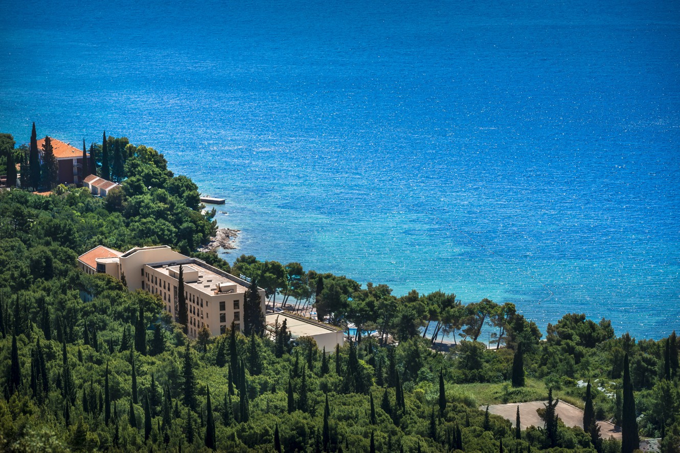 Lush vegetation beach front surrounding of Aminess Vival Grand Azur Hotel in Orebic, Peljesac peninsula.