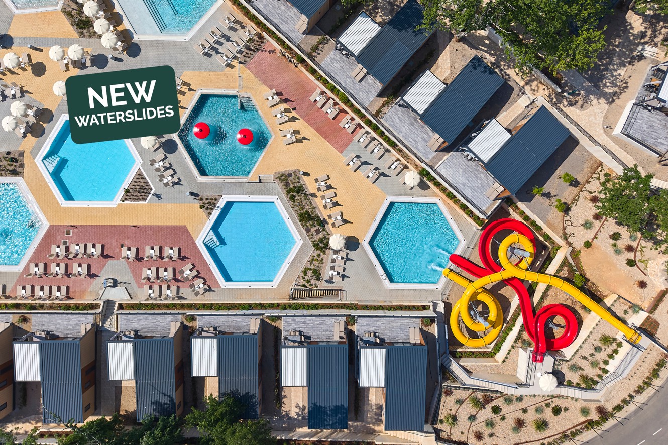 Aerial view of pools and new waterslides at Aminess Atea Camping Resort for family holidays.