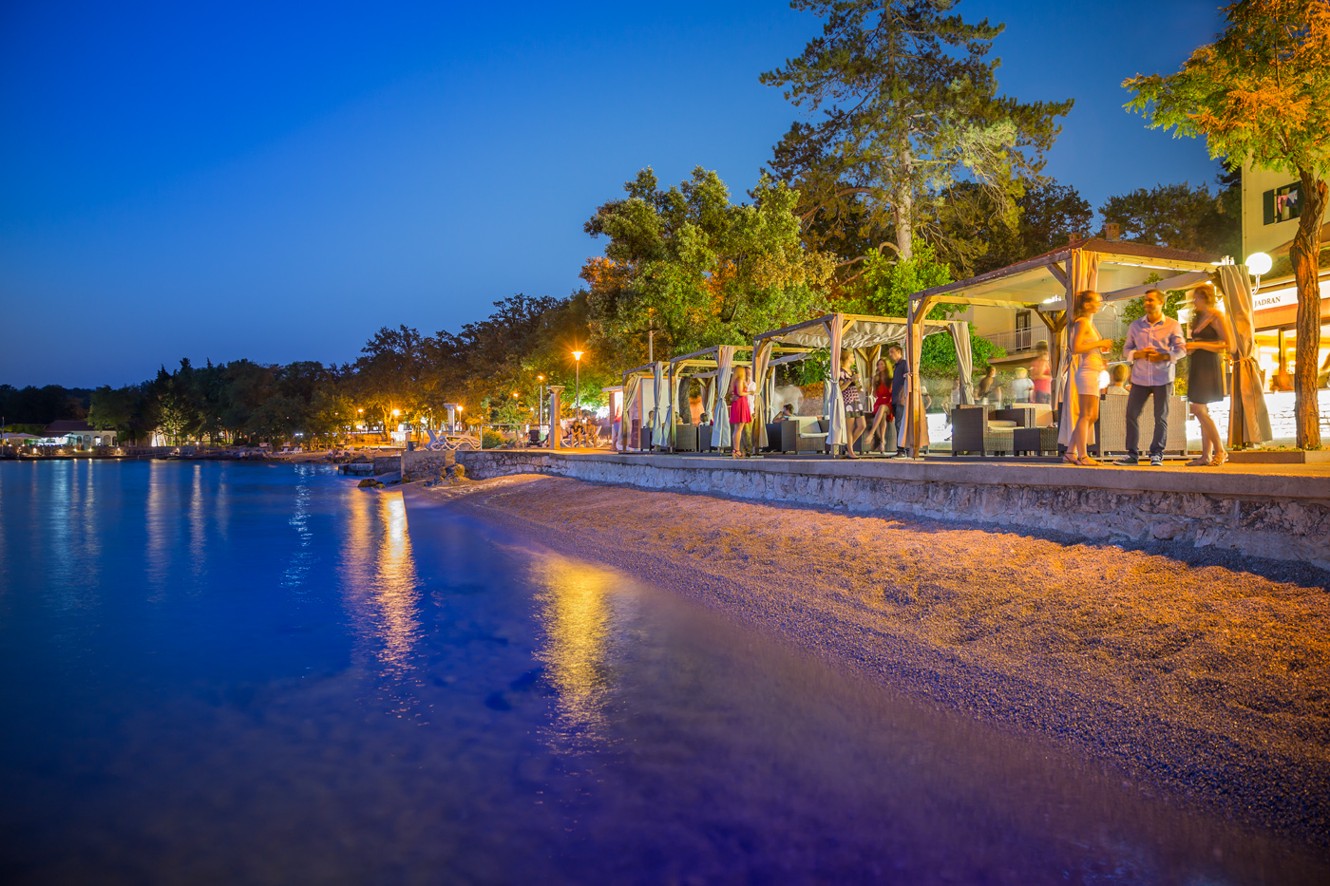 Evening view of the beach near Veya Maradiso Hotel by Aminess.