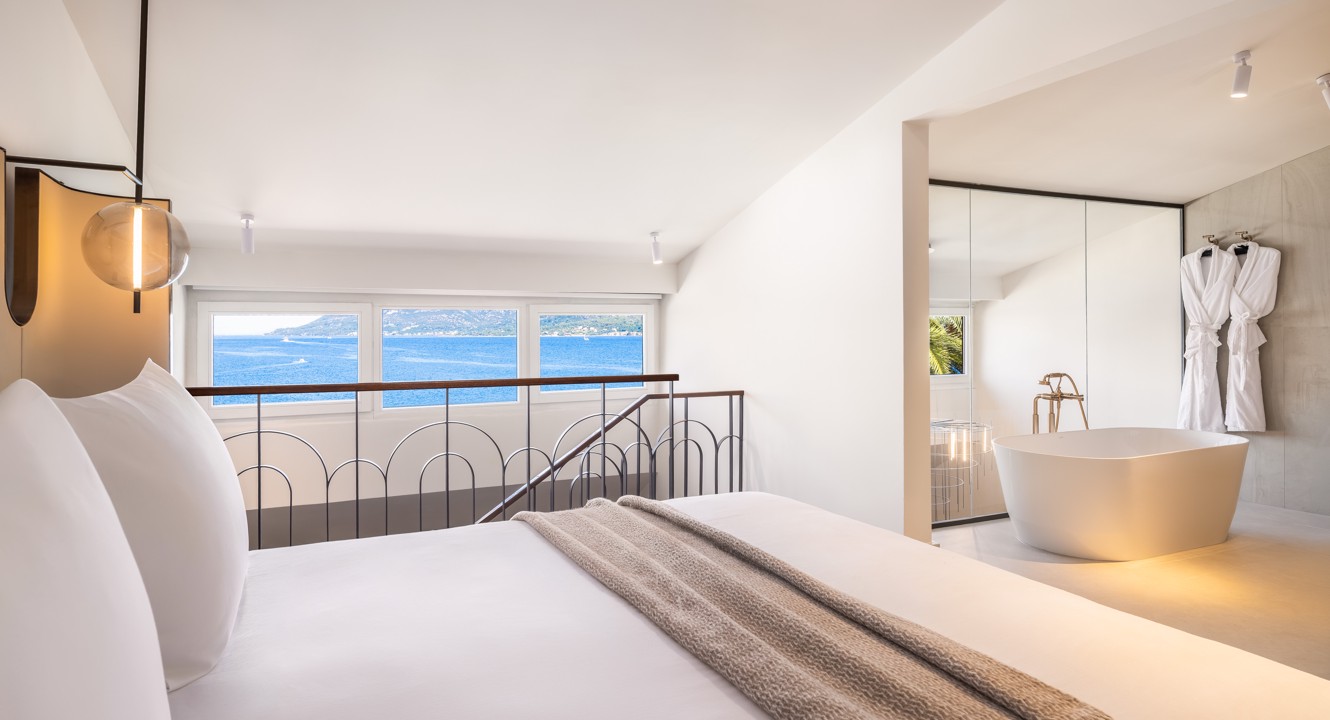 Spacious luxury duplex suite interior with a sea view