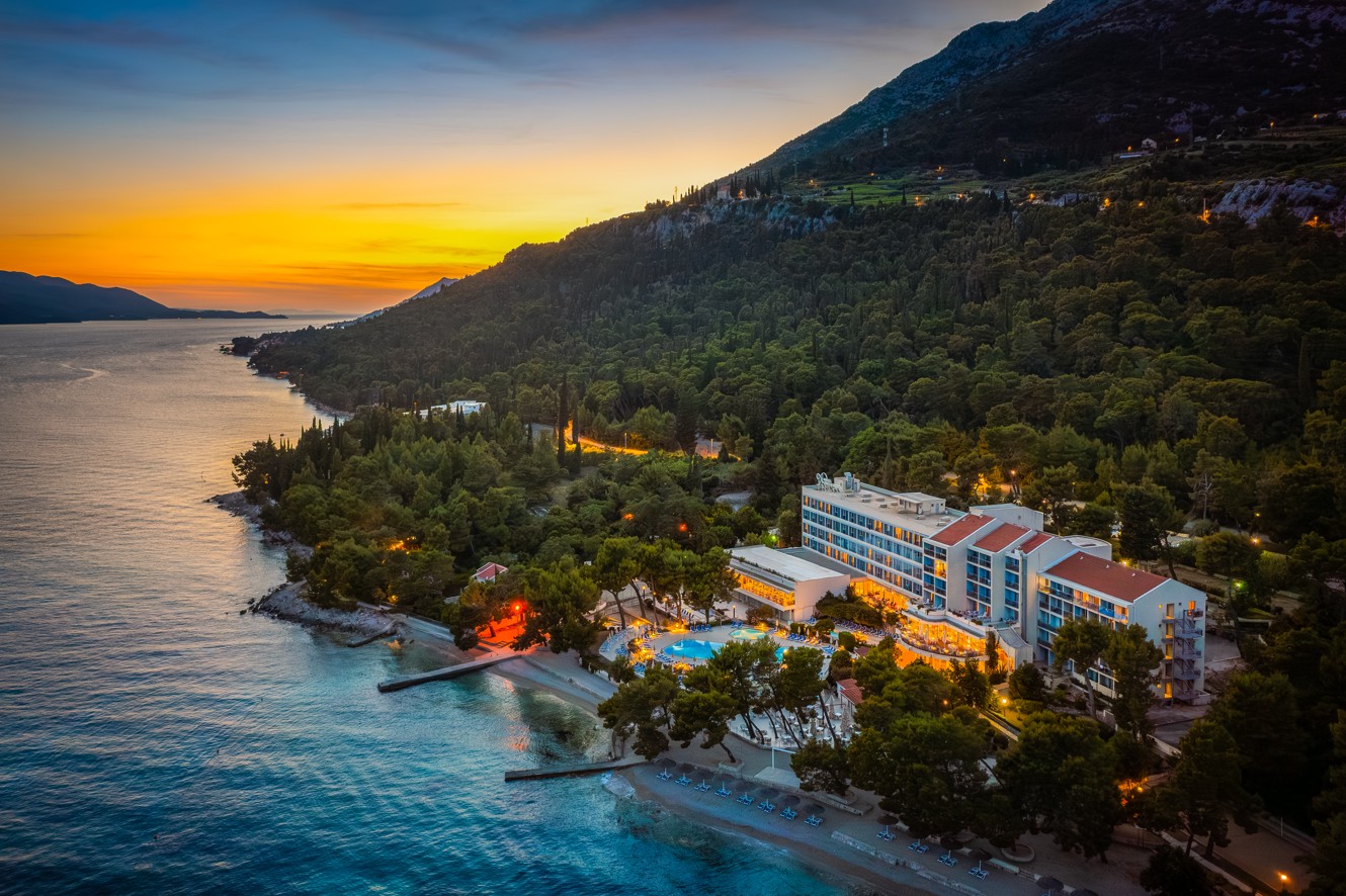 Beach front Aminess Vival Grand Azur Hotel overlooking the Saint Ilija mountain near Orebic and a crystal clear sea.