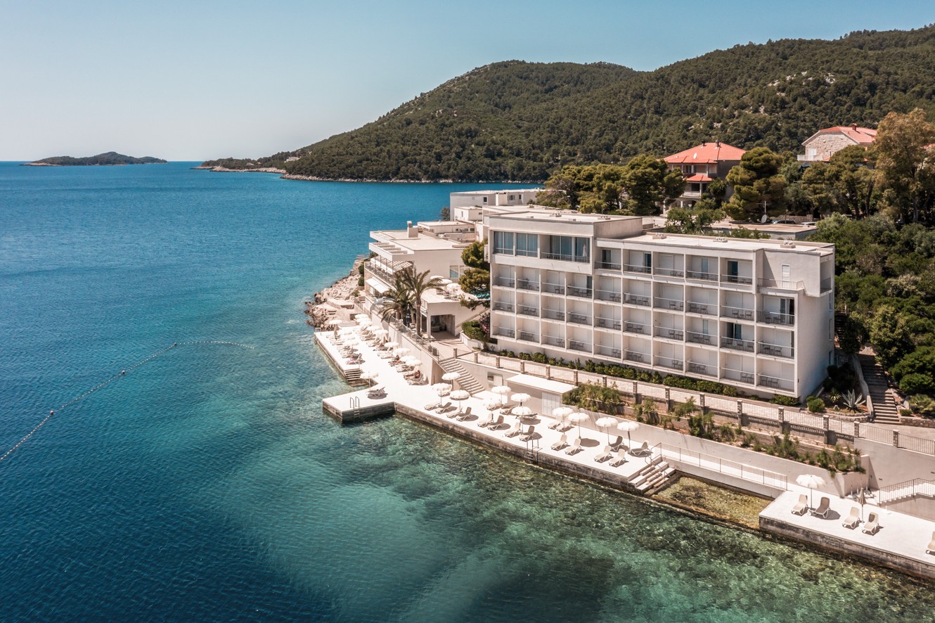 Panoramic view of Aminess Lume Hotel by the coast and pine trees