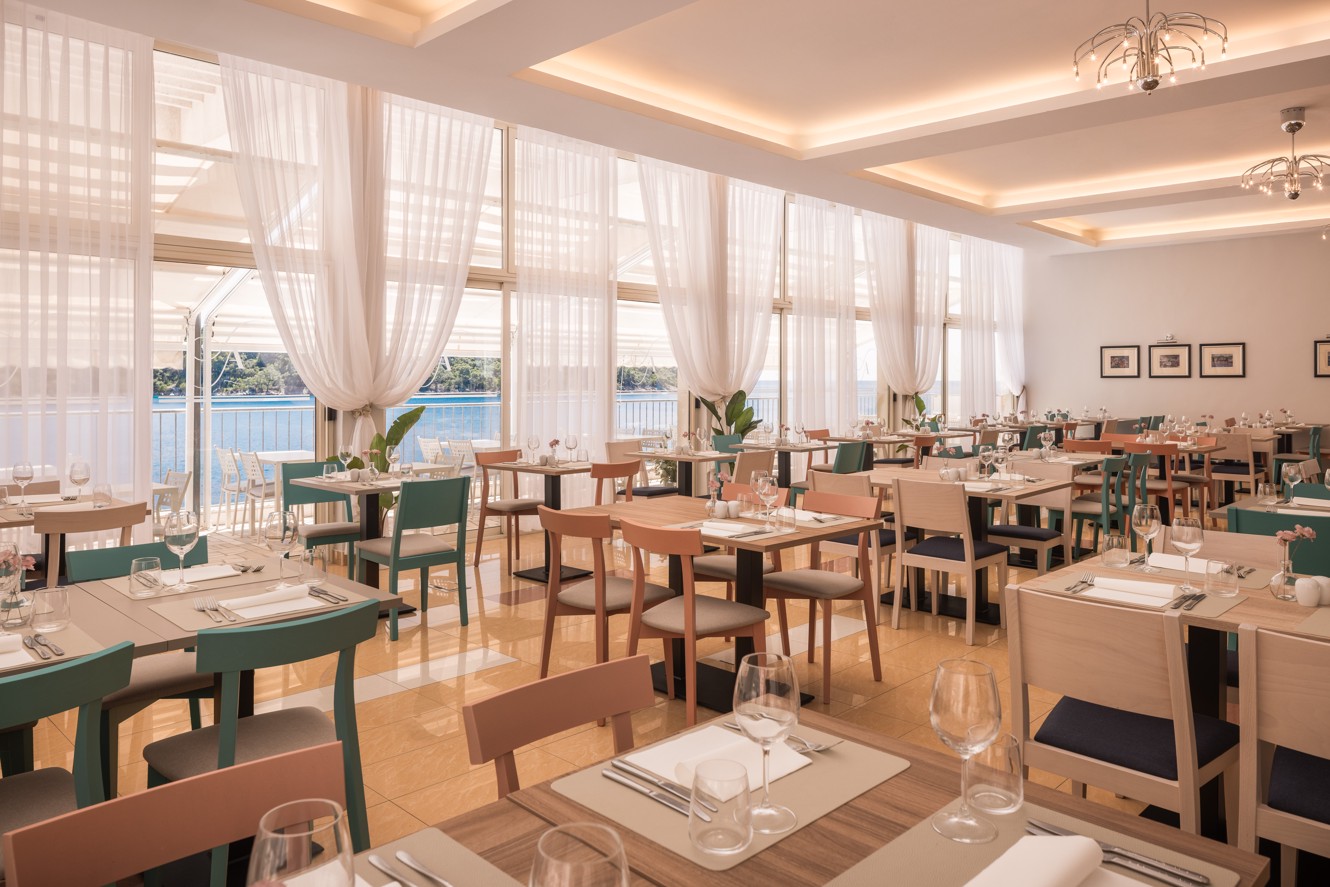 Elegant interior of the Unico restaurant at Aminess Lume Hotel