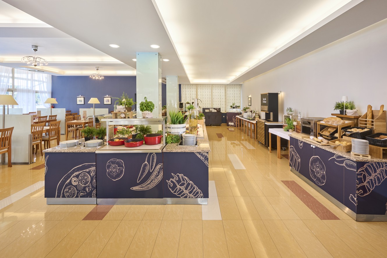 Modern yet traditional ambiance of a small, cozy, island waterfront at Aminess Younique Lume Hotel in Croatia.