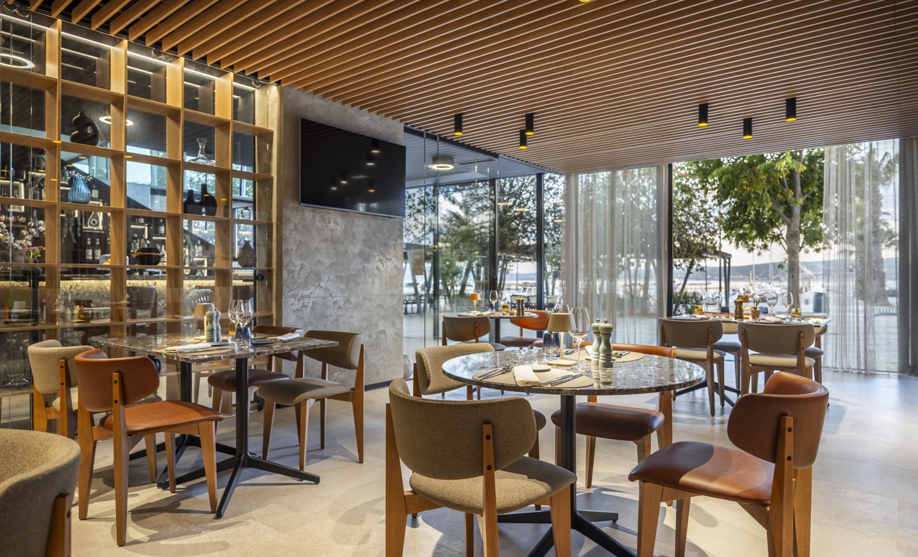 Modern interior of Half8 restaurant at Aminess Younique Narrivi Hotel.