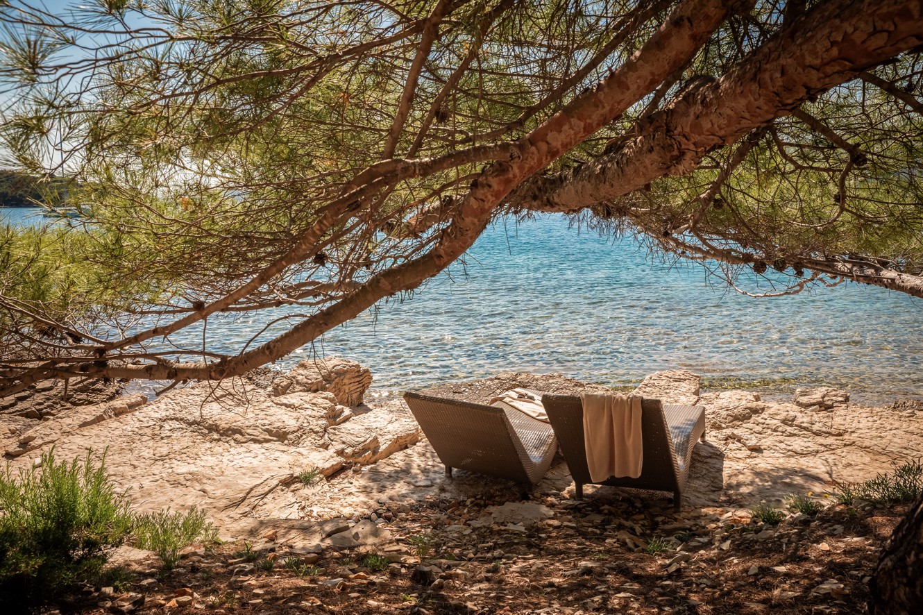 Beach and sea in front of Aminess Younique Senses Resort Hvar