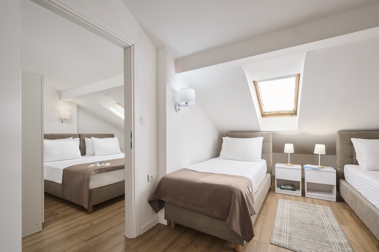 Junior suite with twin beds at Aminess Maradiso Hotel