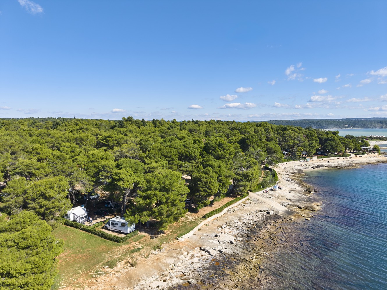 Panoramic view of the beach and sea at Aminess Planet Camping Sirena Holiday Homes in Novigrad, featuring crystal-clear water and a perfect spot for relaxation