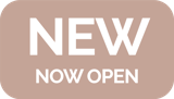 Younique Piktogramm mit der Aufschrift NEW NOW OPEN.