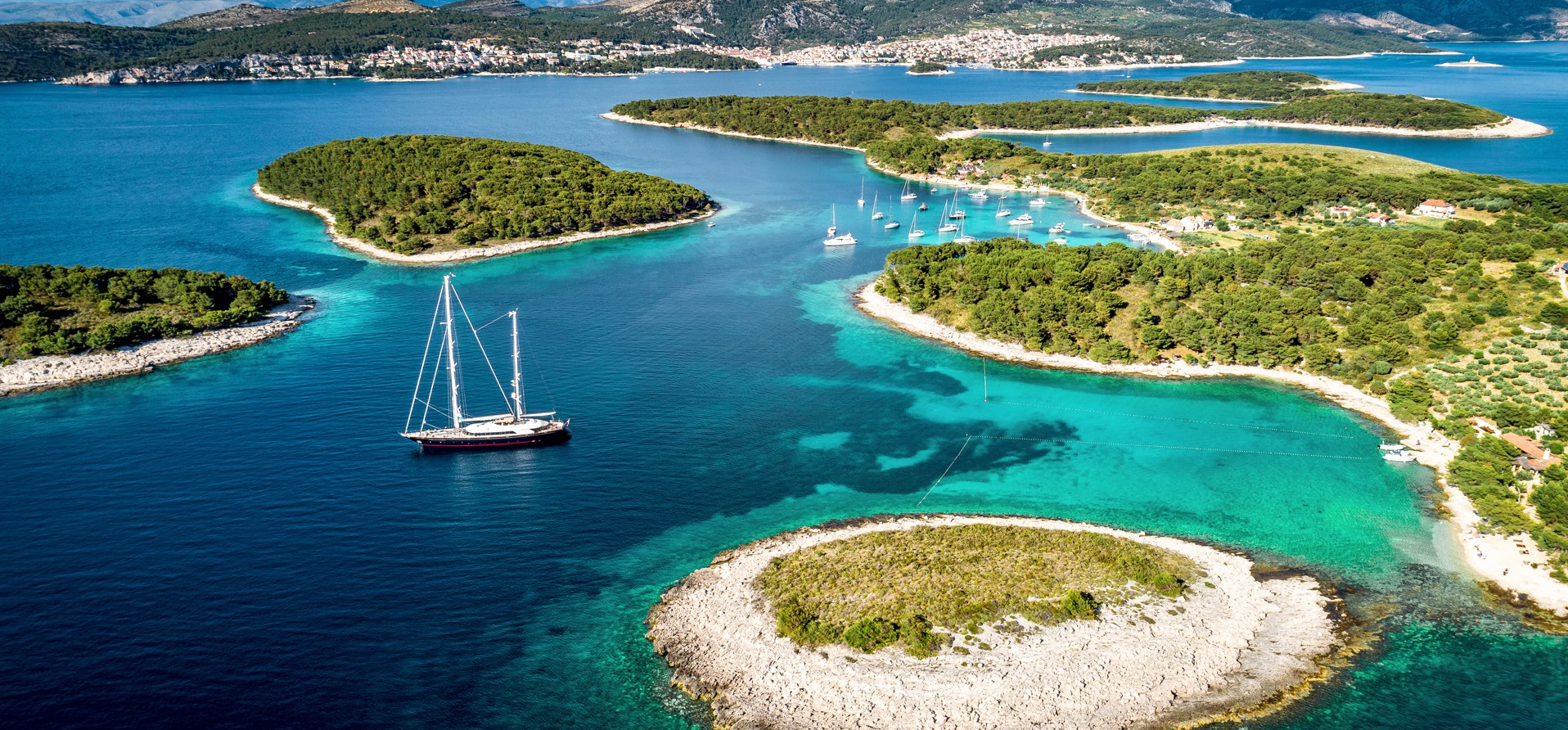 Lavender fields on Hvar Island, Croatia, featuring vibrant purple blooms, rolling hills, and a serene Mediterranean landscape – Aminess destination travel.