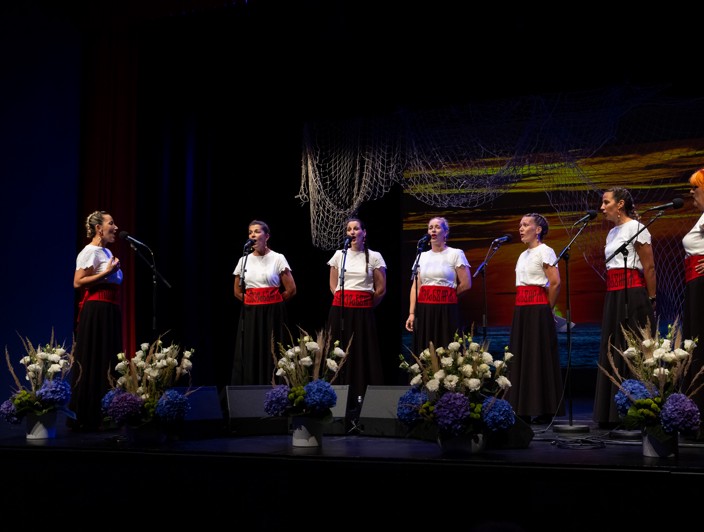 Traditional Klapa performance on Hvar Island, Croatia, featuring local singers in authentic attire celebrating Dalmatian musical heritage.