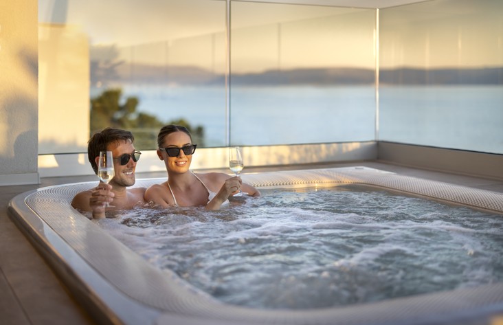 Relaxing jacuzzi experience at Aminess Younique Narrivi Hotel with serene Adriatic Sea views.