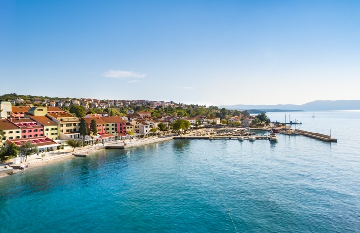Exterior view of Veya Maradiso Hotel by Aminess located along the picturesque waterfront.
