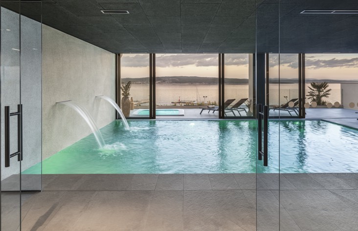 Indoor swimming pool at Aminess Younique Narrivi Hotel.