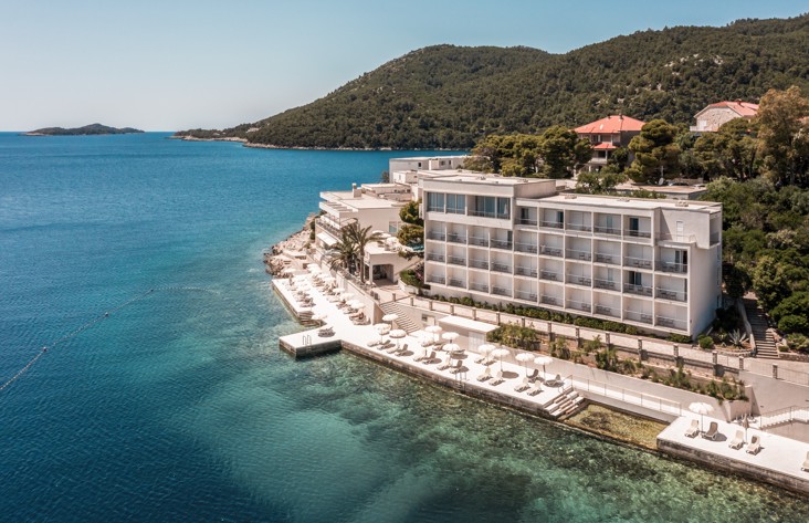 Panoramic view of Aminess Lume Hotel by the coast and pine trees