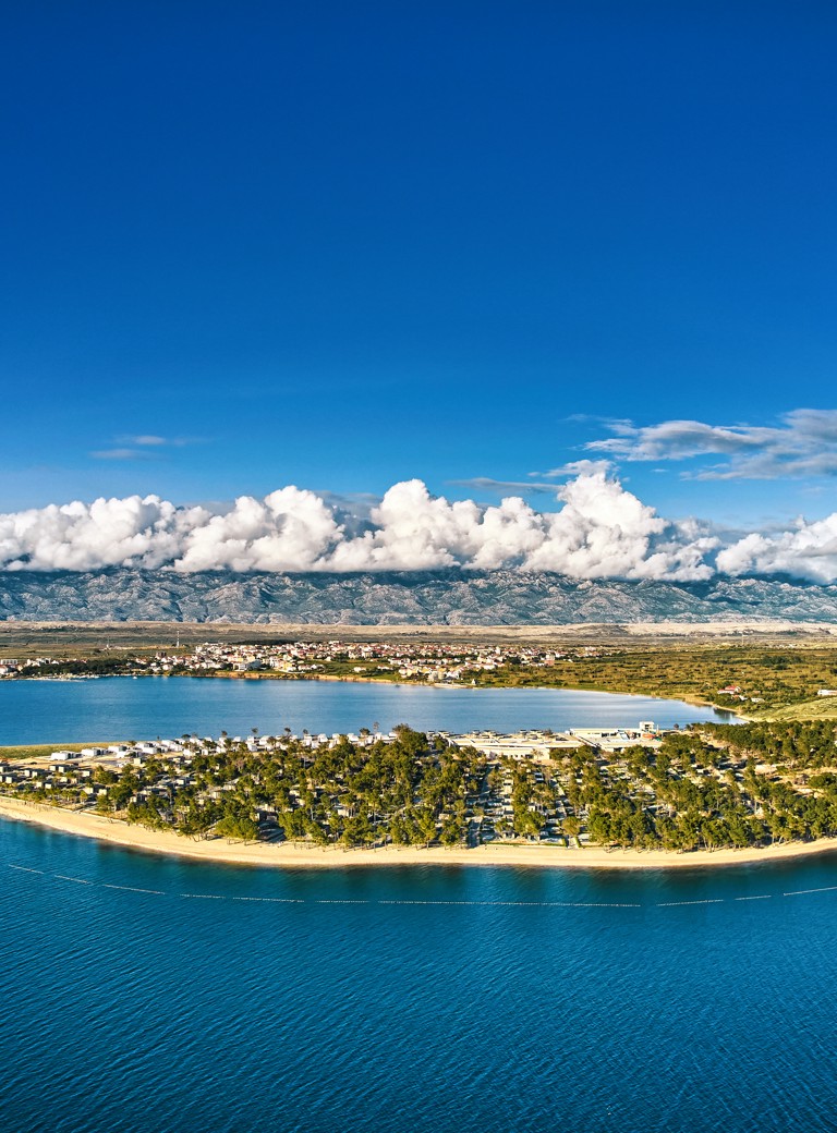 Panoramic view of Aminess Style Camping Avalona resort with clear sea.