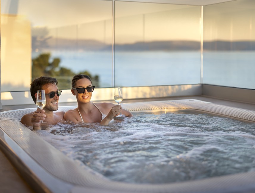 Relaxing jacuzzi experience at Aminess Younique Narrivi Hotel with serene Adriatic Sea views.
