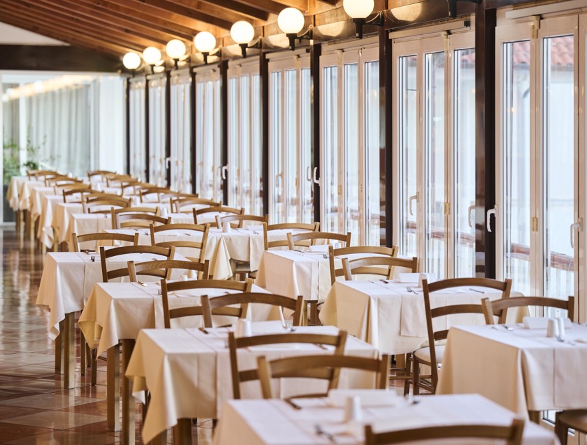 Sitting room at Mediteran Maradiso Hotel by Aminess, perfect for enjoying meals.