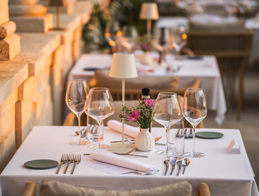 Luxury table setting at the terrace of 7 Seas Restaurant & Bar within Aminess Korcula Heritage Hotel.