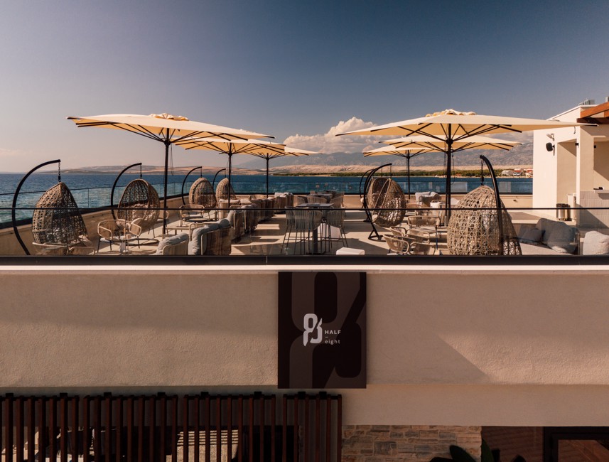 Terrace of the Half 8 restaurant by the sea with an open sea view at the Aminess Avalona Camping Resort