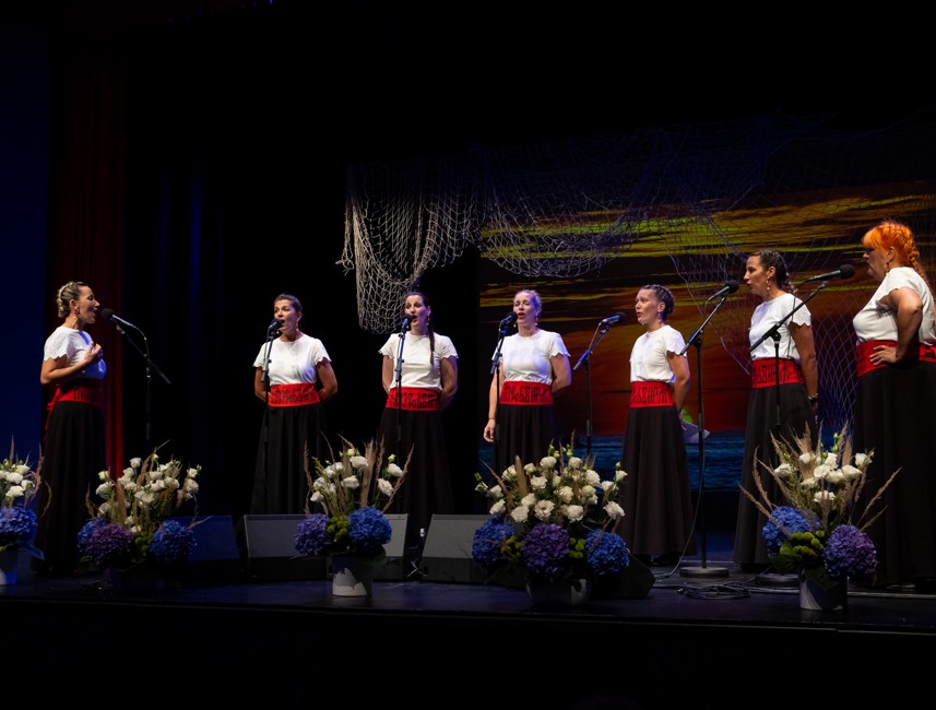 Traditional Klapa performance on Hvar Island, Croatia, featuring local singers in authentic attire celebrating Dalmatian musical heritage.