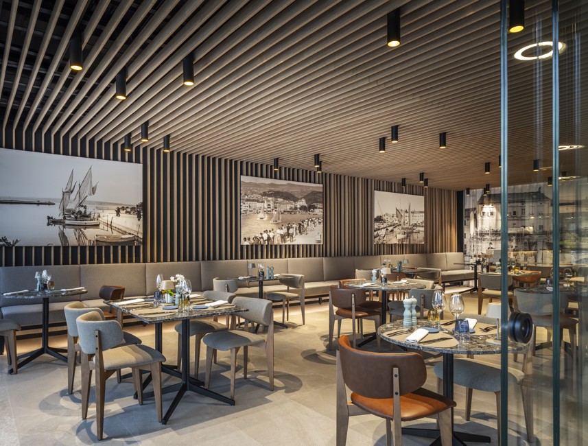 Modern sitting area at Half8 restaurant at Aminess Younique Narrivi Hotel.