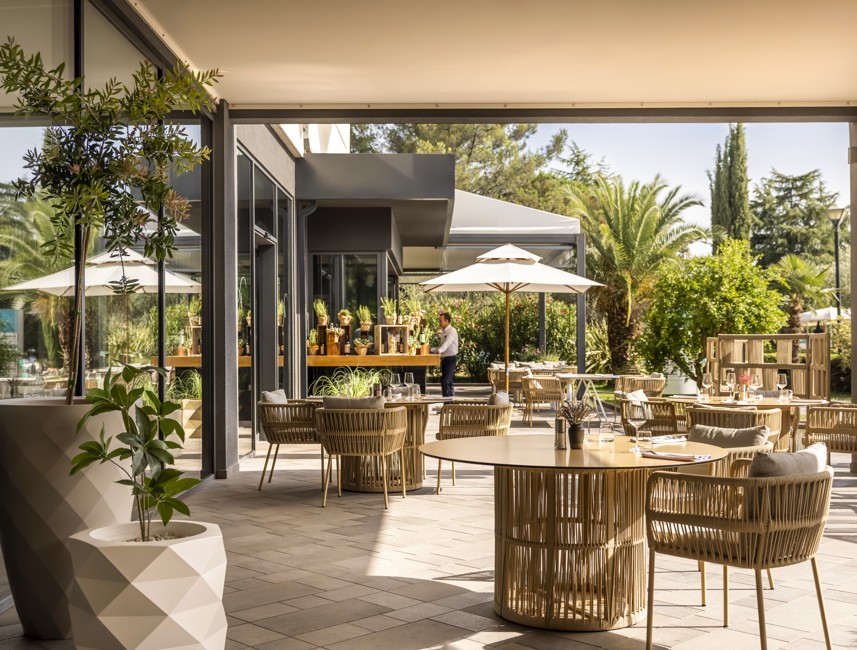 Oliveto terrace outdoor dining at Aminess Planet Camping Sirena, Novigrad, Croatia