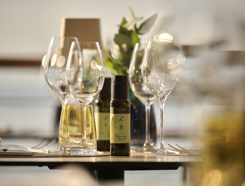 Table setting featuring Vergal olive oil at 7 Seas Restaurant & Bar.