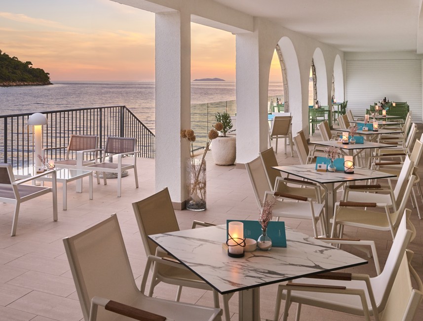 Modern yet traditional ambiance of a small, cozy, island waterfront at Aminess Younique Lume Hotel in Croatia.