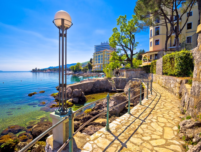 Seaside promenade in Opatija overlooking historic villas and the crystal-clear Kvarner Sea, reflecting the rich history and elegance of the destination